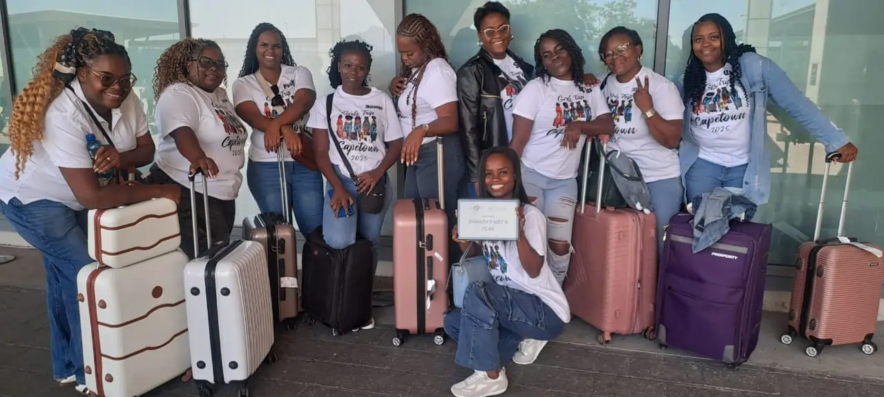 Group of happy travellers at Cape Town International Airport